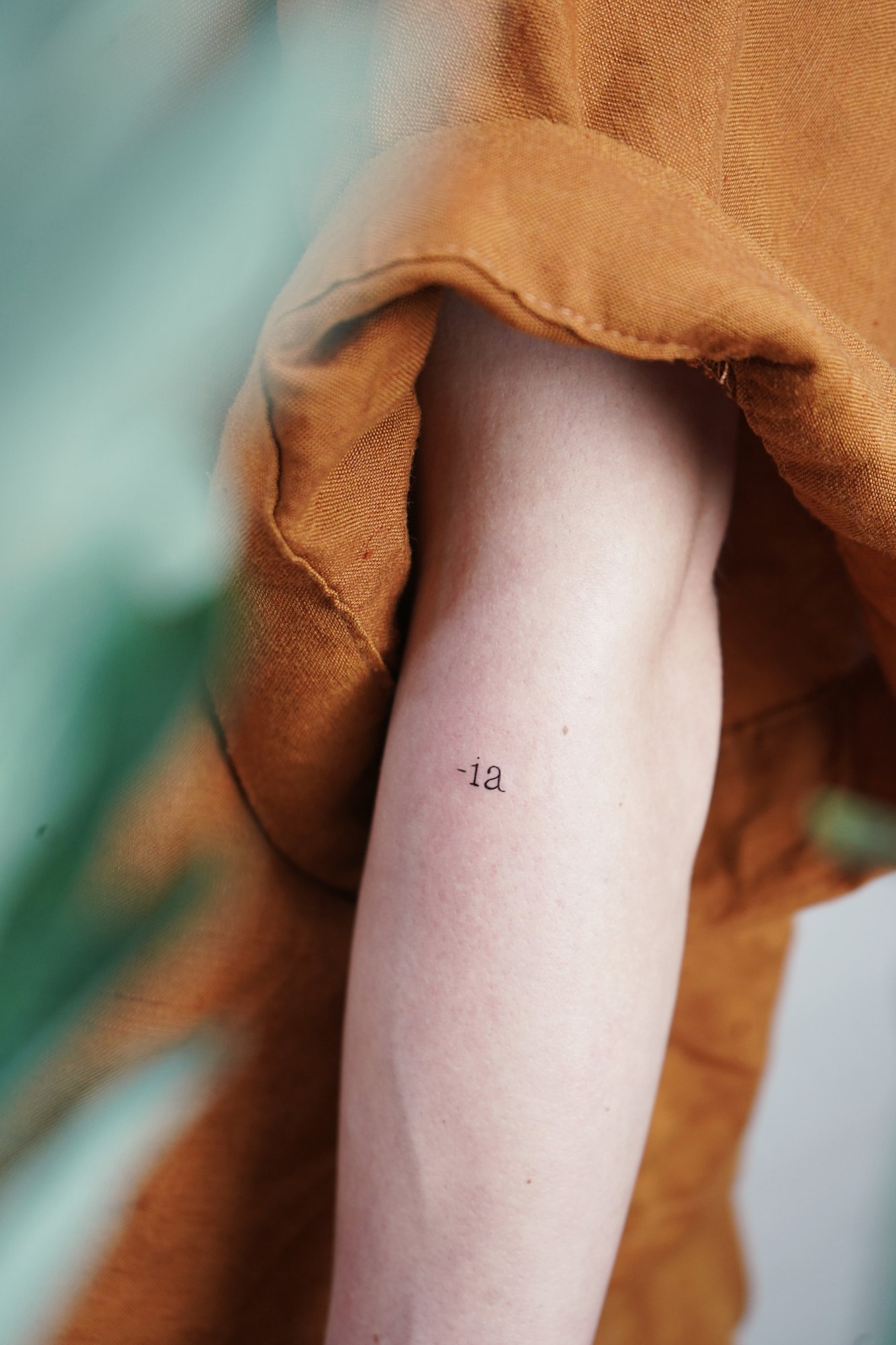 Tatuaje de simbolo en zona desconocida, línea fina