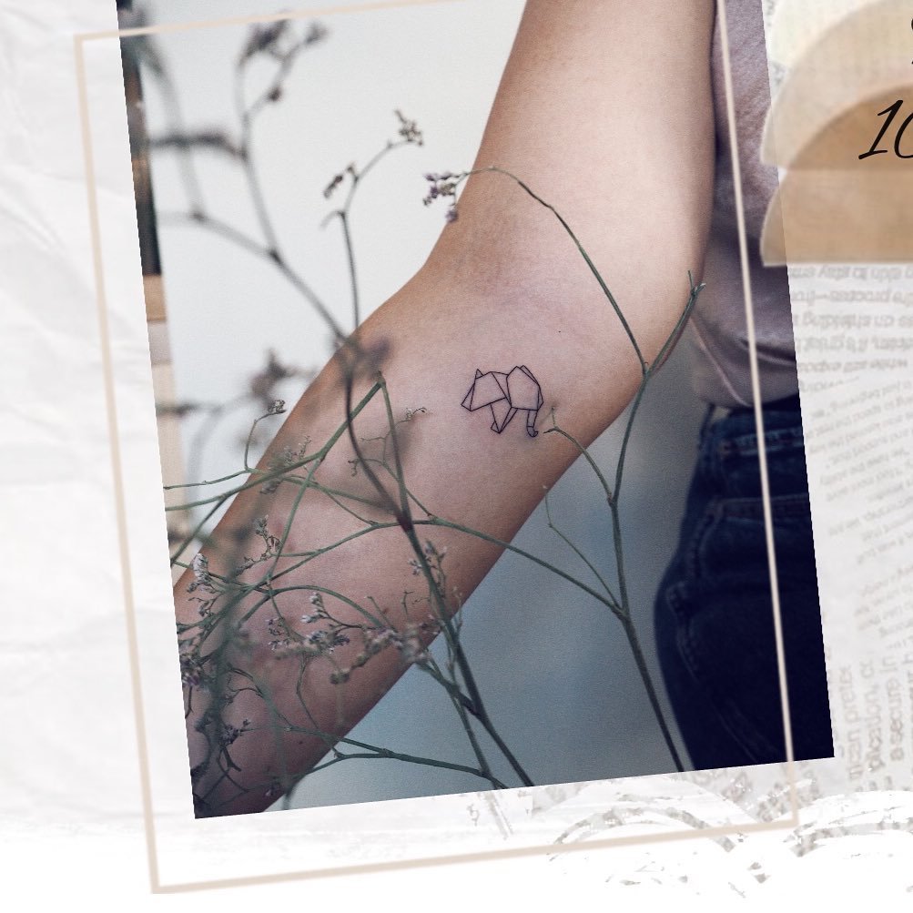 Tatuaje de animal en antebrazo, línea fina Sinkply Madrid