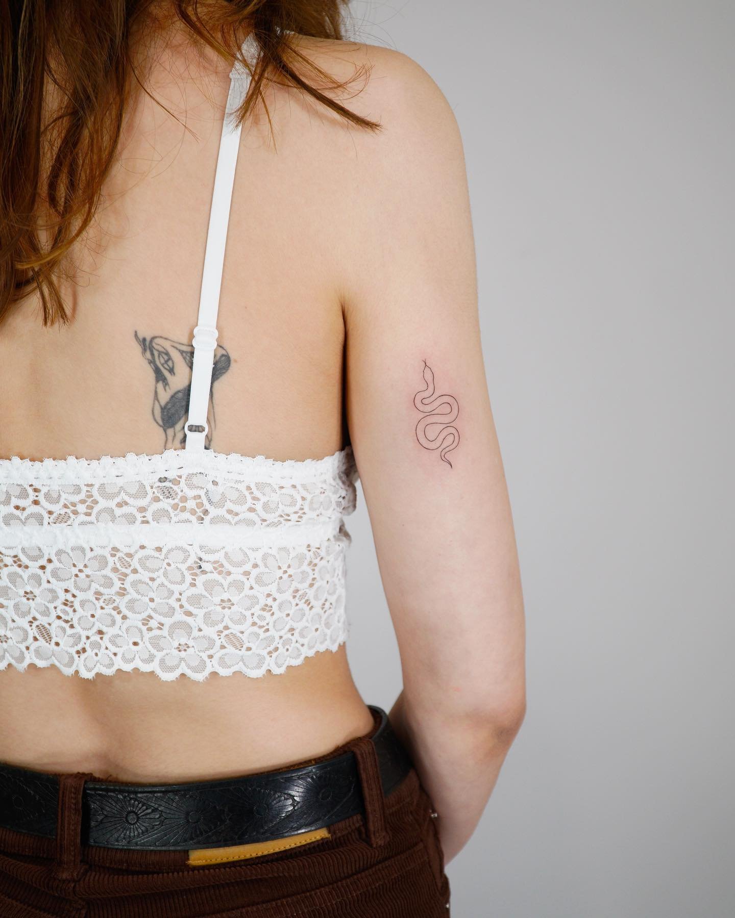 Tatuaje de animal en brazo, línea fina Sinkply Madrid