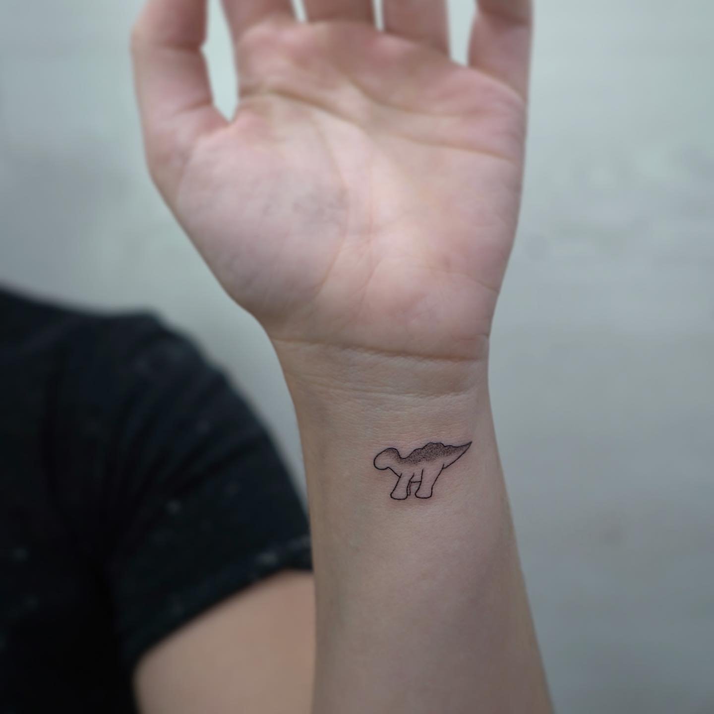 Tatuaje de animal en muneca, línea fina Sinkply Madrid