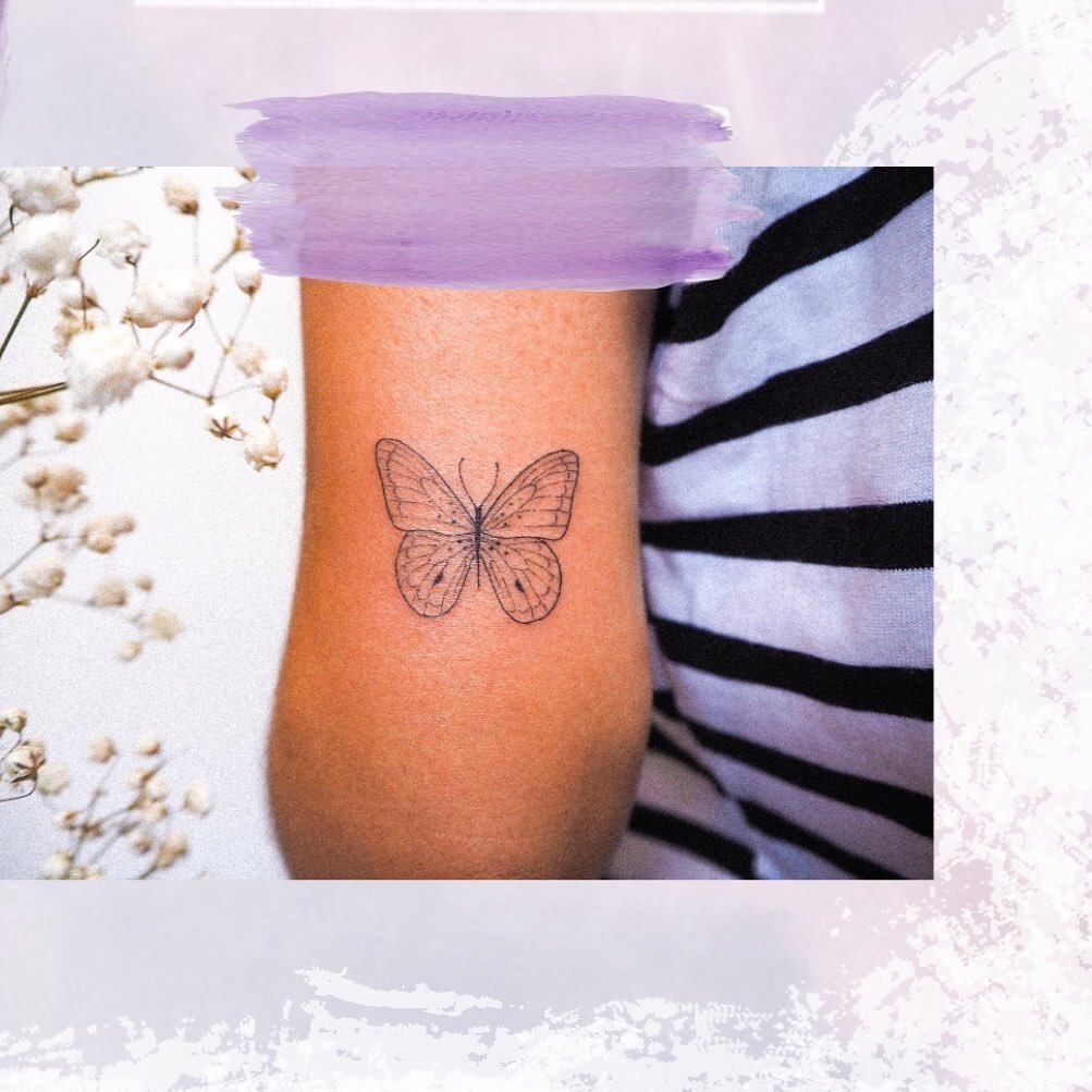 Tatuaje de mariposa en antebrazo, línea fina Sinkply Madrid