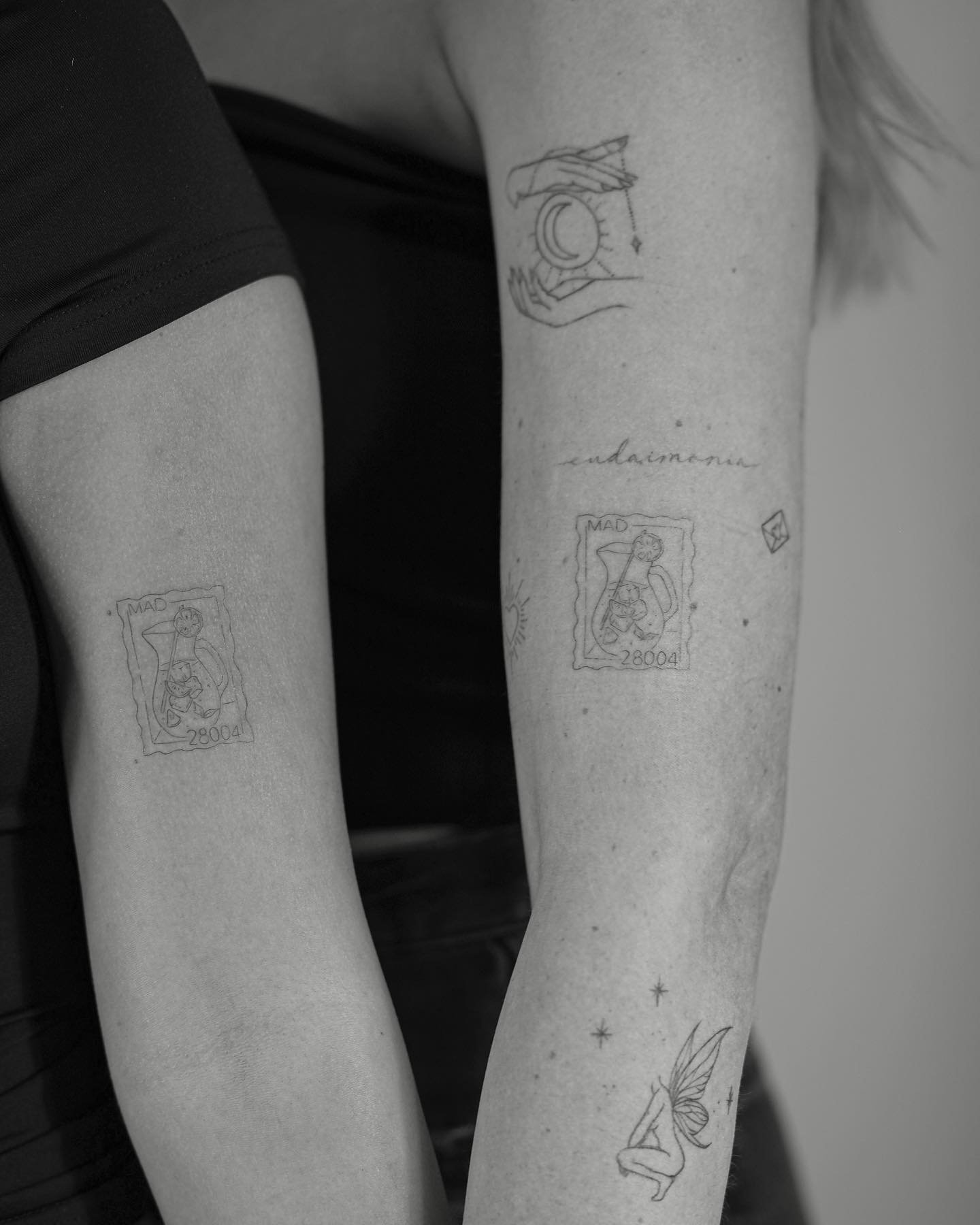 Tatuaje de mariposa en brazo, línea fina Sinkply Madrid