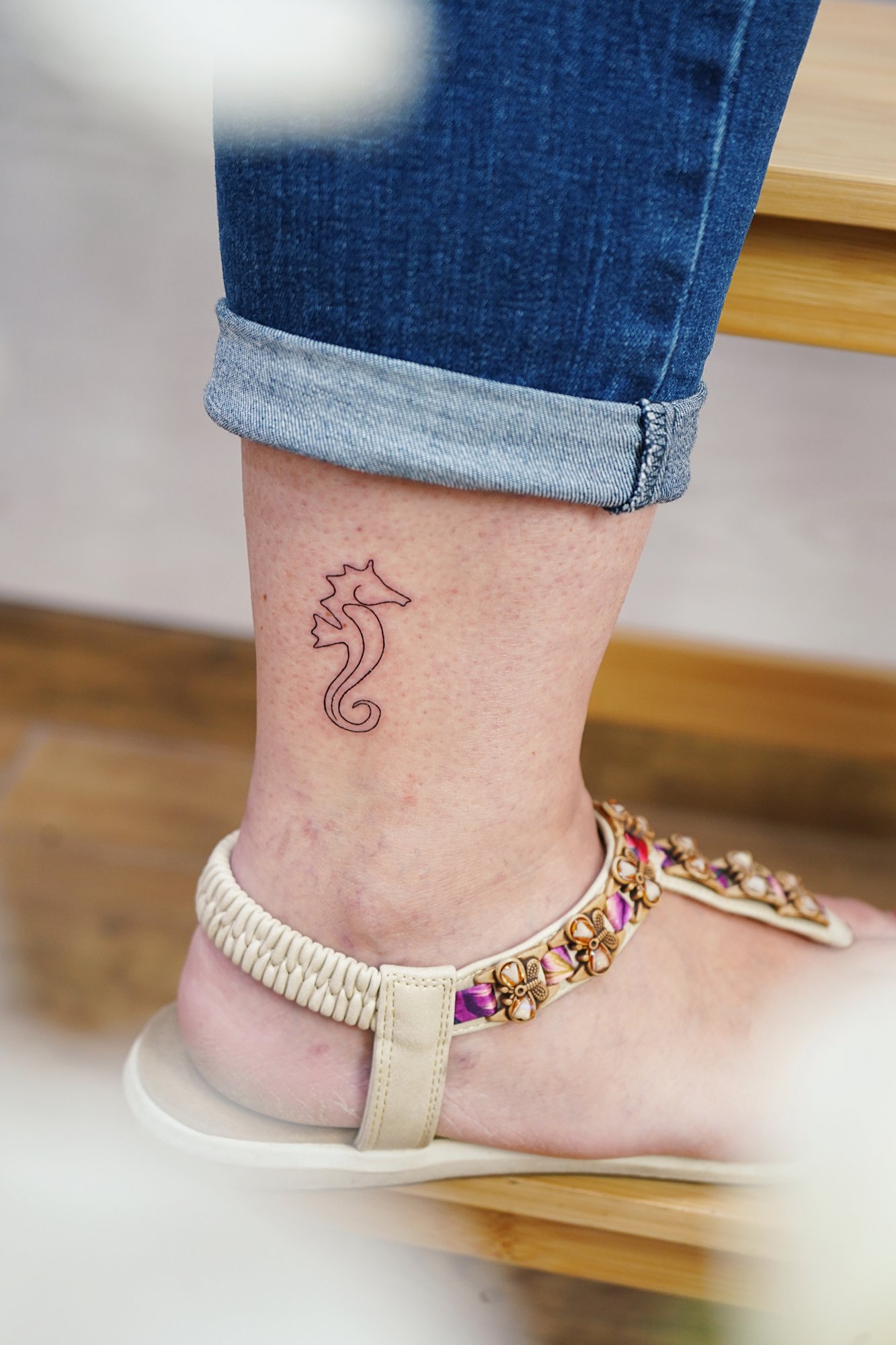 Tatuaje de caballitos mar en zona desconocida, línea fina