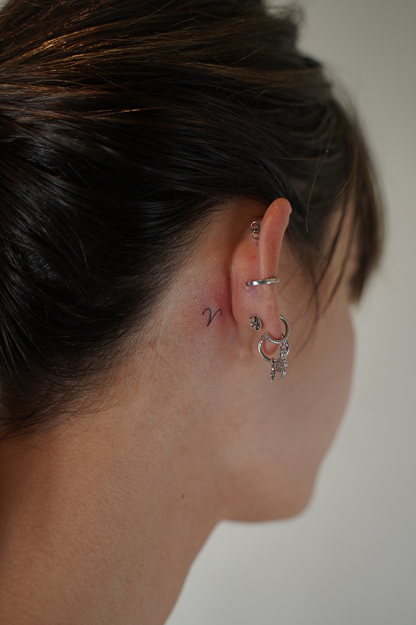 Tatuaje de destellos en zona desconocida, línea fina