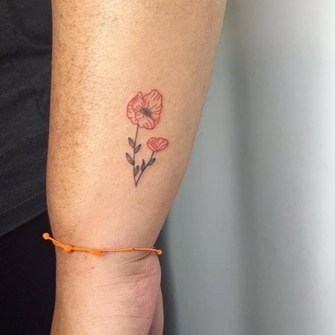 Tatuaje de flor en antebrazo, línea fina Sinkply Madrid