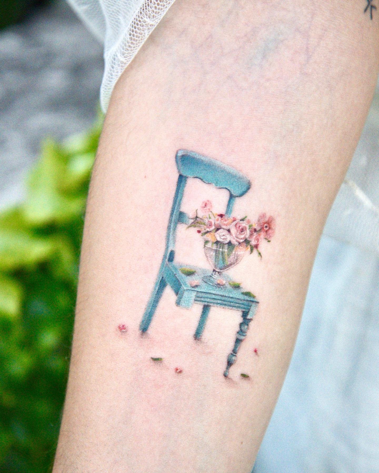 Tatuaje de flor en antebrazo, línea fina Sinkply Madrid