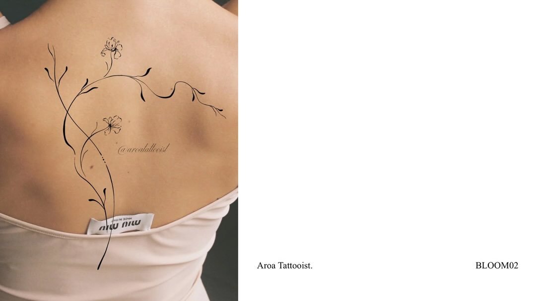 Tatuaje de flor en espalda, línea fina Sinkply Madrid