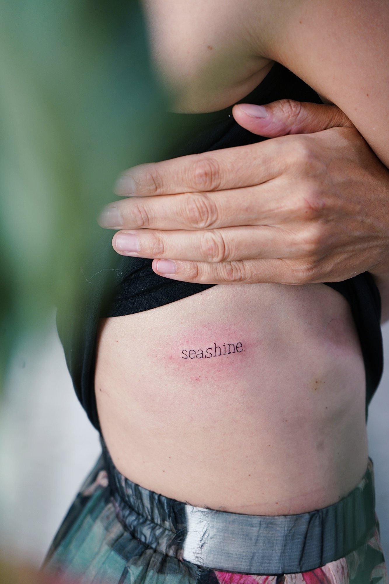 Tatuaje de coordenadas en zona desconocida, línea fina