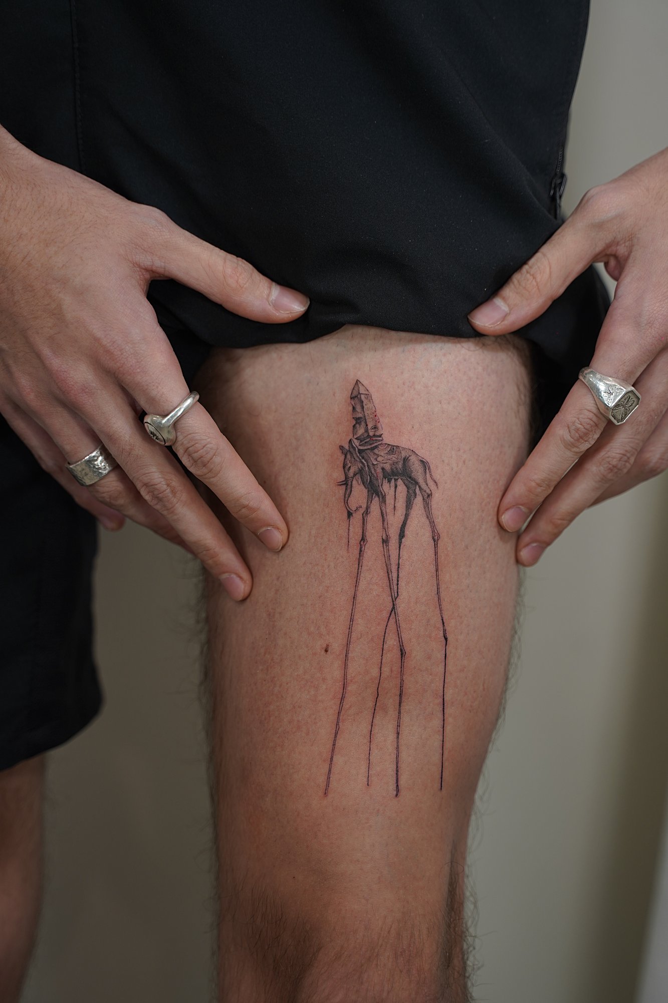 Tatuaje de frase en zona desconocida, línea fina
