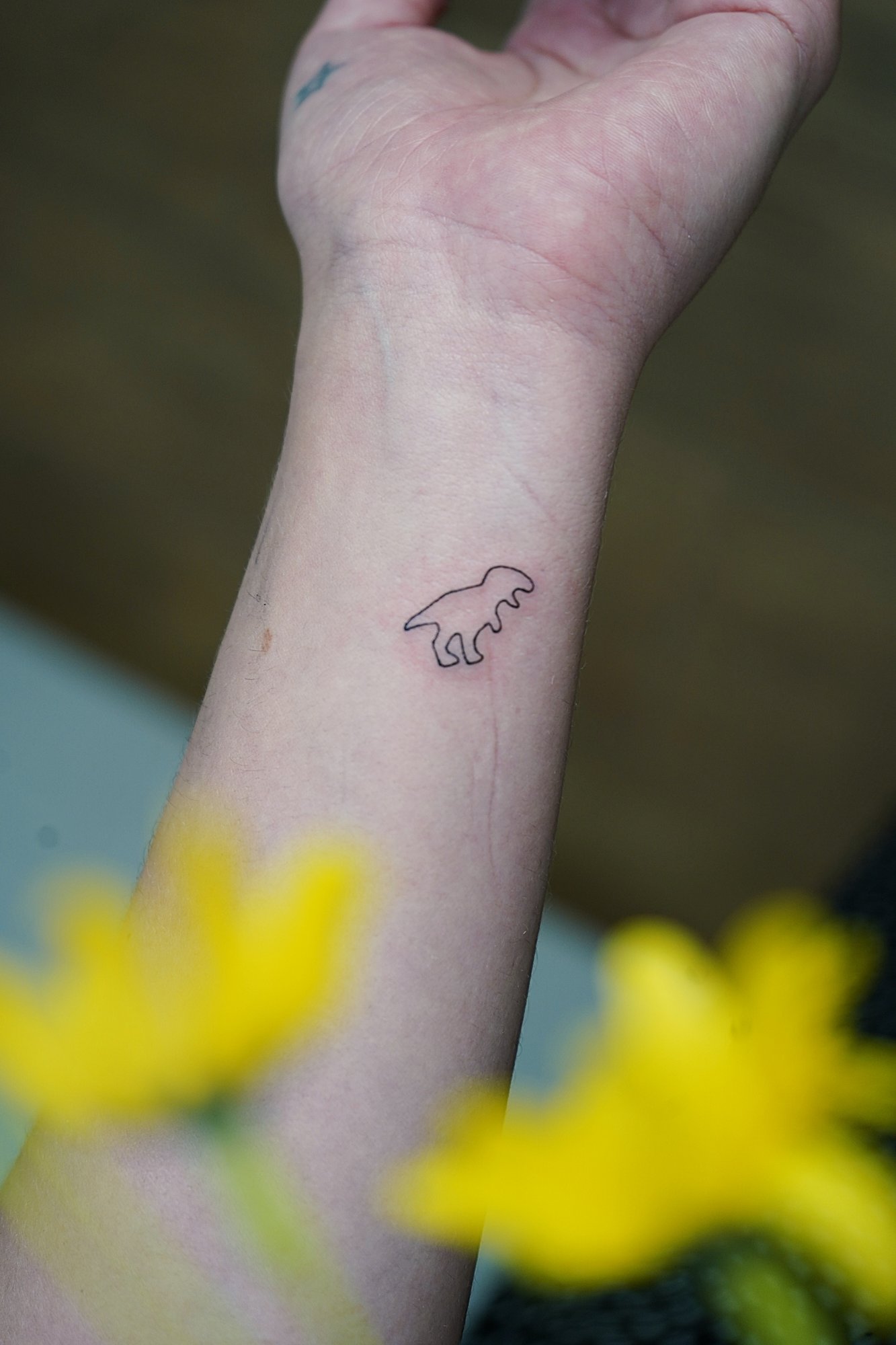 Tatuaje de numero tres en zona desconocida, línea fina