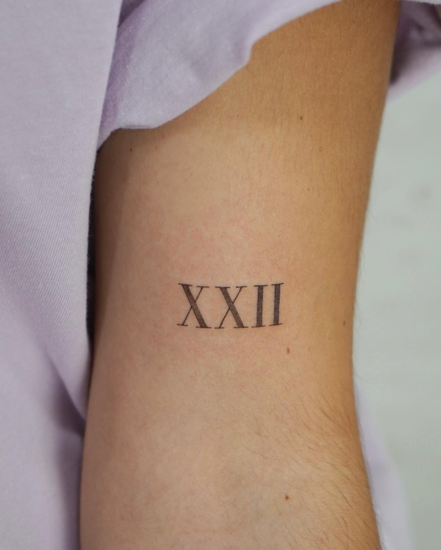 Tatuaje de frase en antebrazo, línea fina Sinkply Madrid