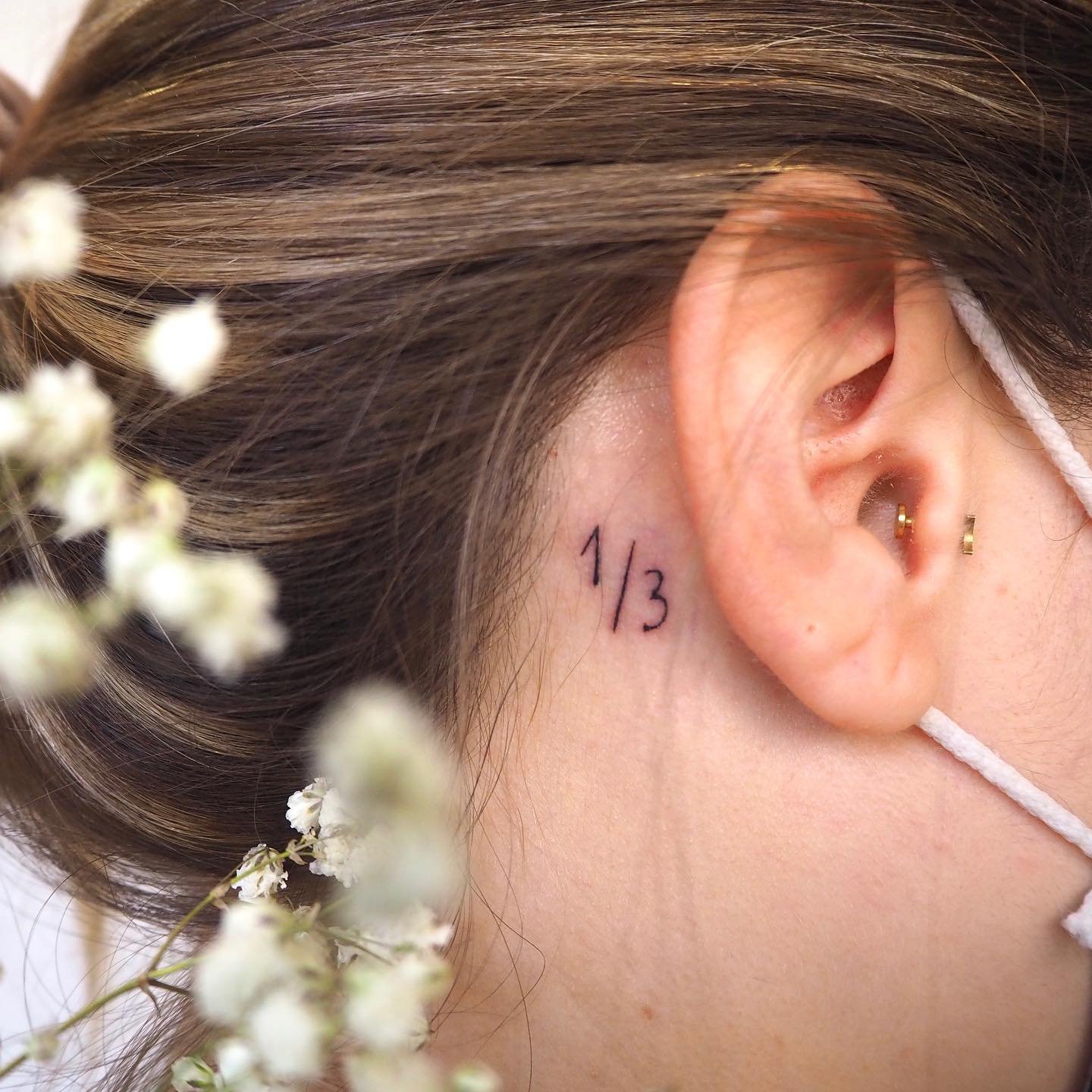 Tatuaje de frase en cuello, línea fina Sinkply Madrid