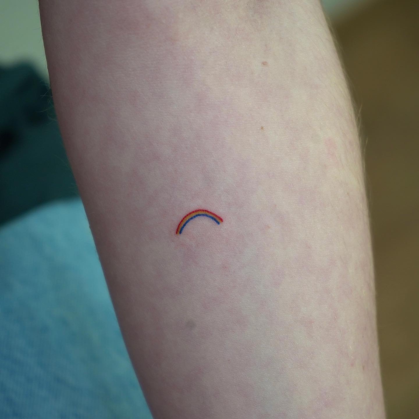 Tatuaje de destellos en antebrazo, línea fina Sinkply Madrid