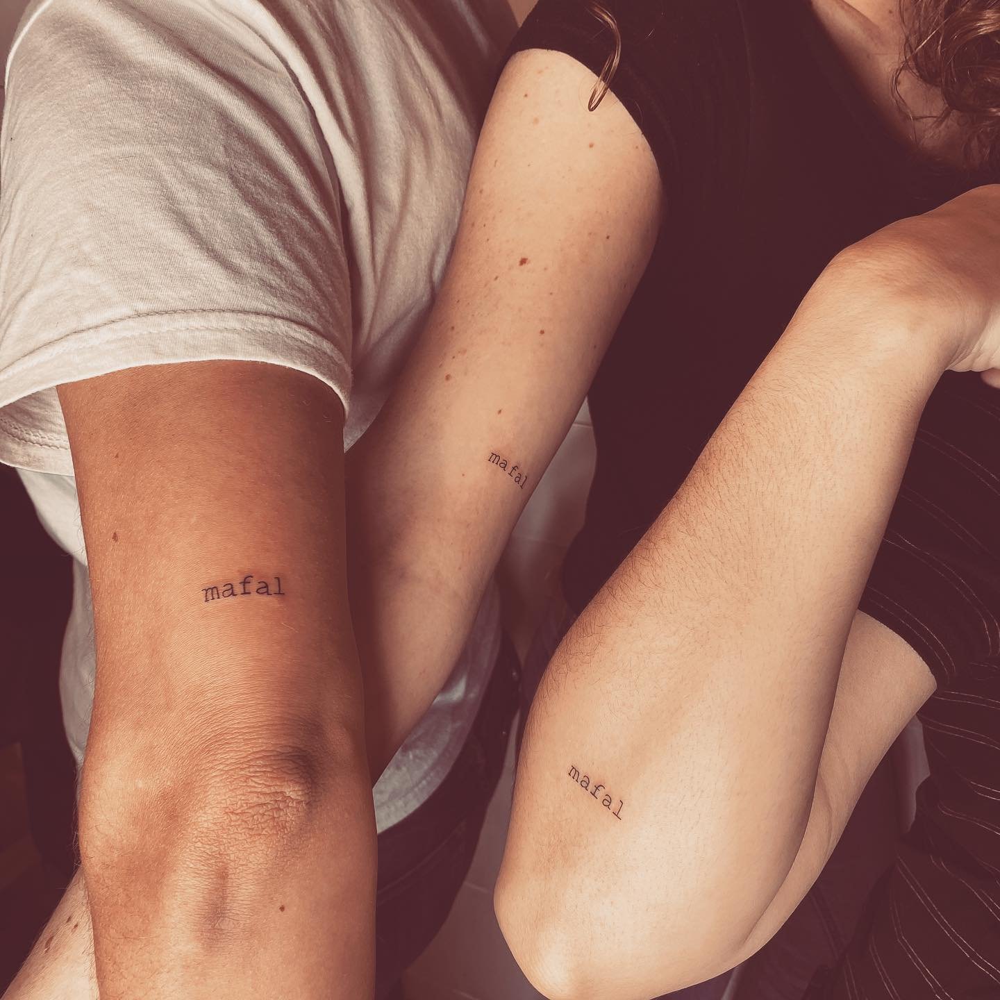 Tatuaje de matching en antebrazo, línea fina Sinkply Madrid