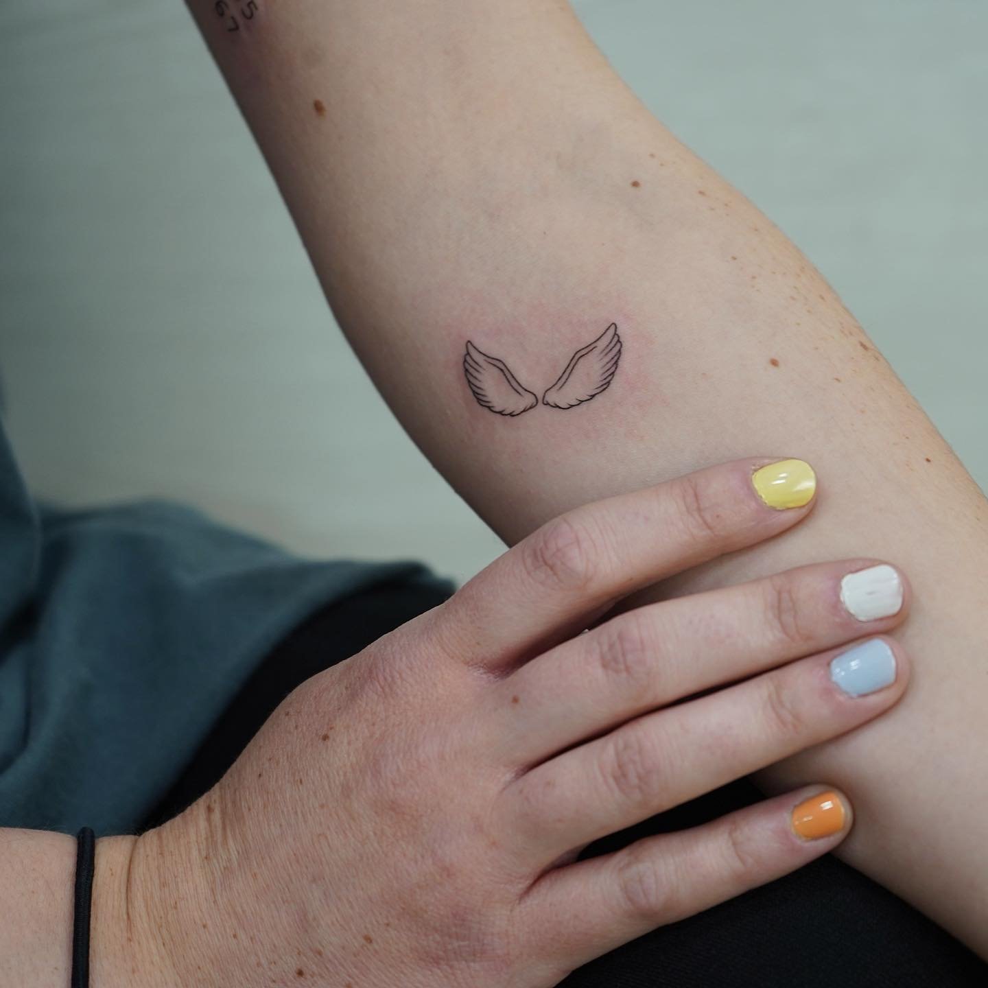 Tatuaje de matching en antebrazo, línea fina Sinkply Madrid