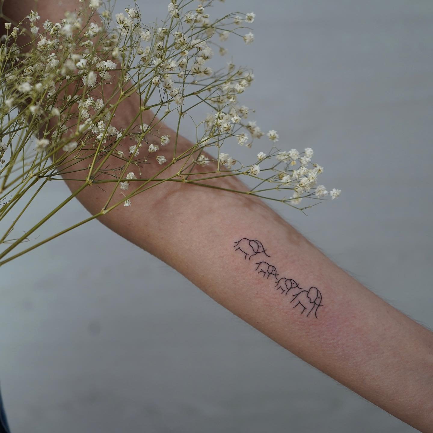 Tatuaje de matching en antebrazo, línea fina Sinkply Madrid