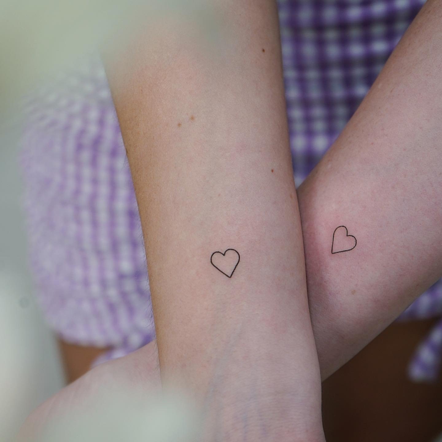 Tatuaje de matching en antebrazo, línea fina Sinkply Madrid
