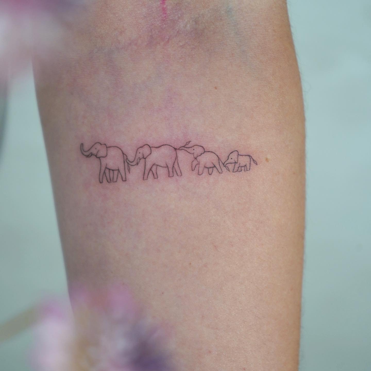 Tatuaje de matching en antebrazo, línea fina Sinkply Madrid