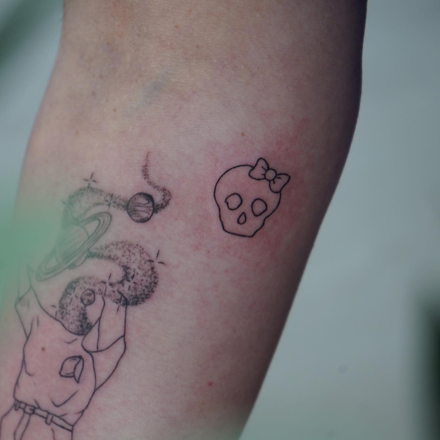 Tatuaje de matching en brazo, línea fina Sinkply Madrid