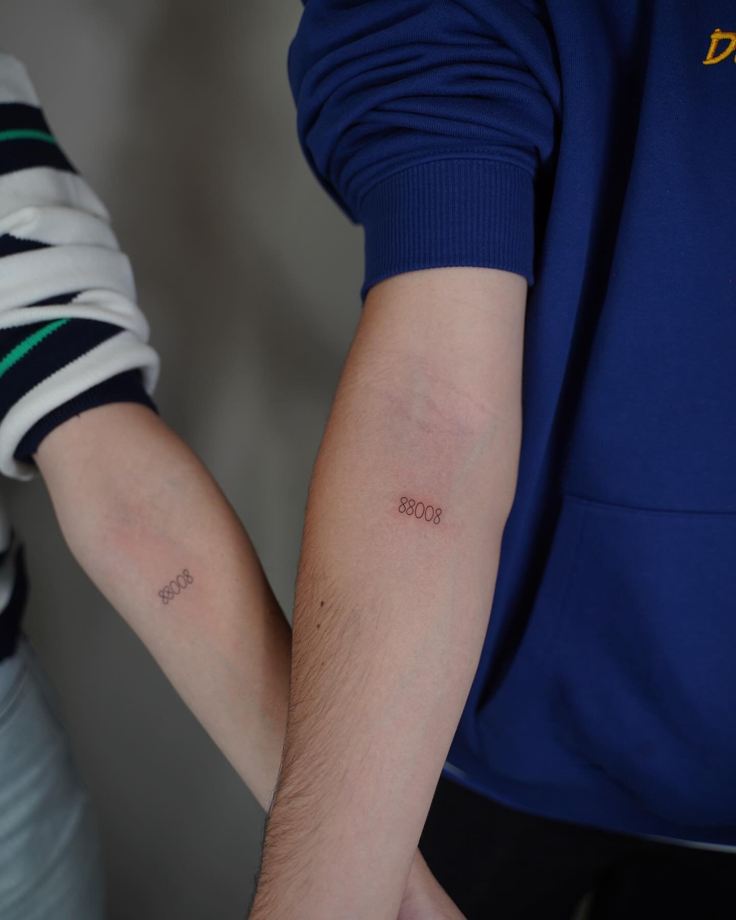 Tatuaje de matching en brazo, línea fina Sinkply Madrid